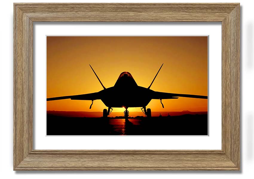 Framed print of an airplane at sunset, showcasing vibrant colors and a beautiful silhouette.