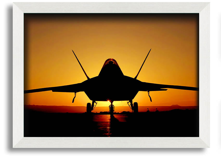 Framed print of an airplane at sunset, showcasing vibrant colors and a beautiful silhouette.