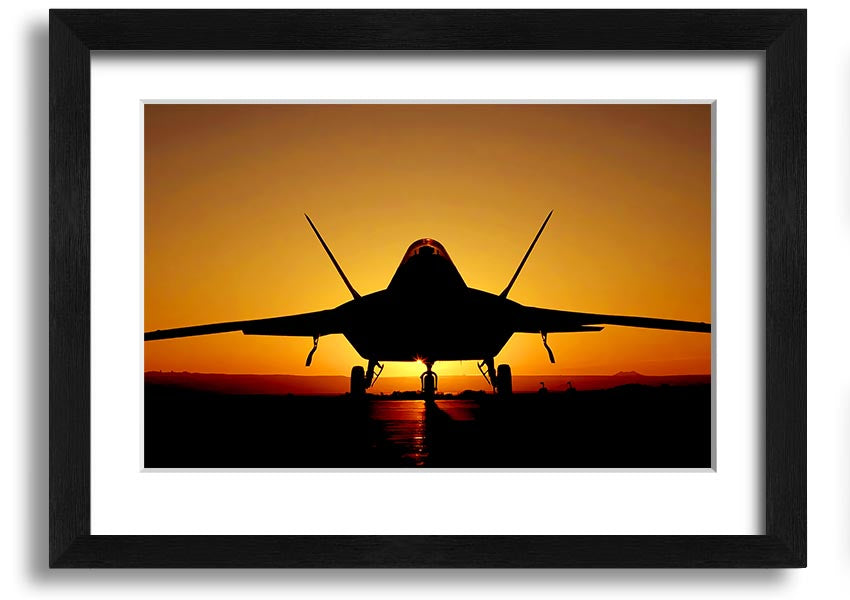 Framed print of an airplane at sunset, showcasing vibrant colors and a beautiful silhouette.