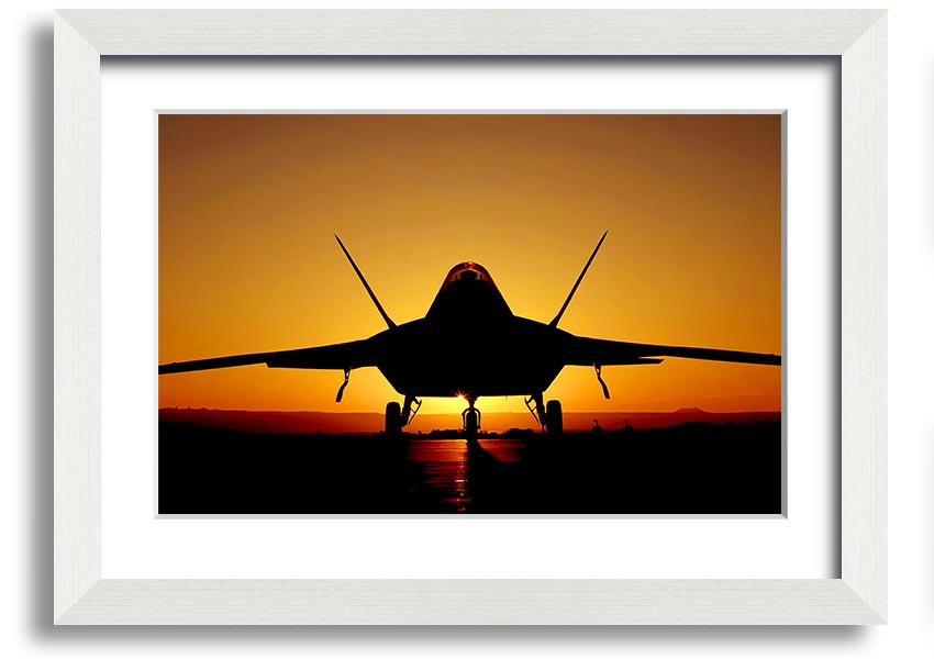 Framed print of an airplane at sunset, showcasing vibrant colors and a beautiful silhouette.