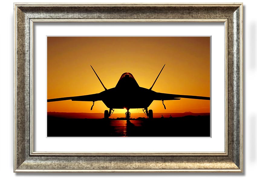 Framed print of an airplane at sunset, showcasing vibrant colors and a beautiful silhouette.