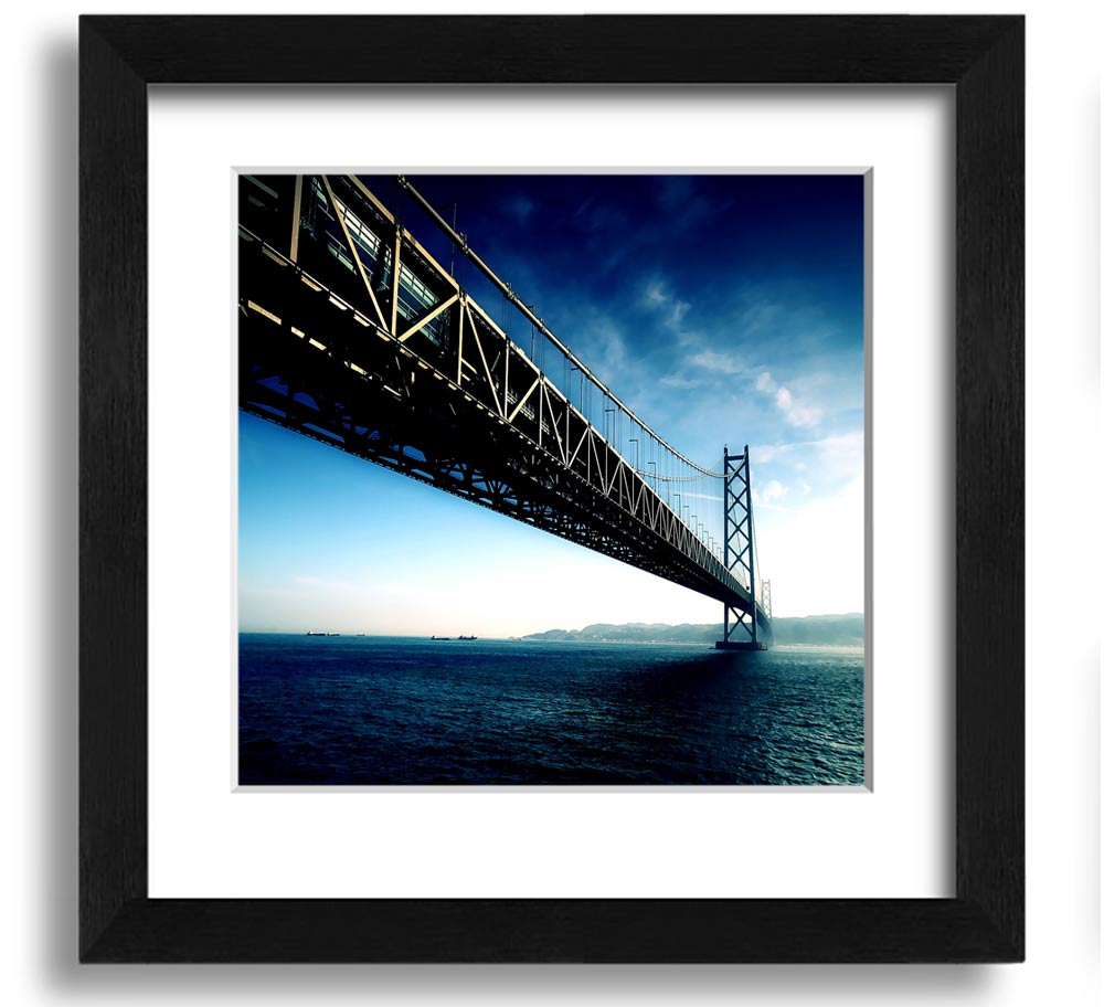 Square framed print of the Akashi Kaikyo Bridge in Japan, showcasing its stunning architecture and scenic backdrop.