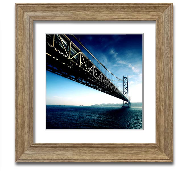 Square framed print of the Akashi Kaikyo Bridge in Japan, showcasing its stunning architecture and scenic backdrop.