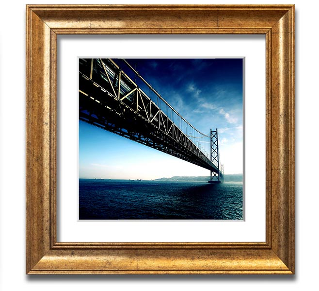 Square framed print of the Akashi Kaikyo Bridge in Japan, showcasing its stunning architecture and scenic backdrop.