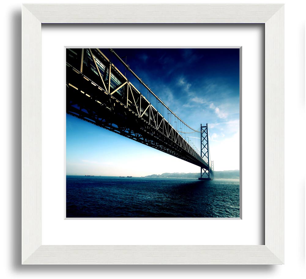 Square framed print of the Akashi Kaikyo Bridge in Japan, showcasing its stunning architecture and scenic backdrop.