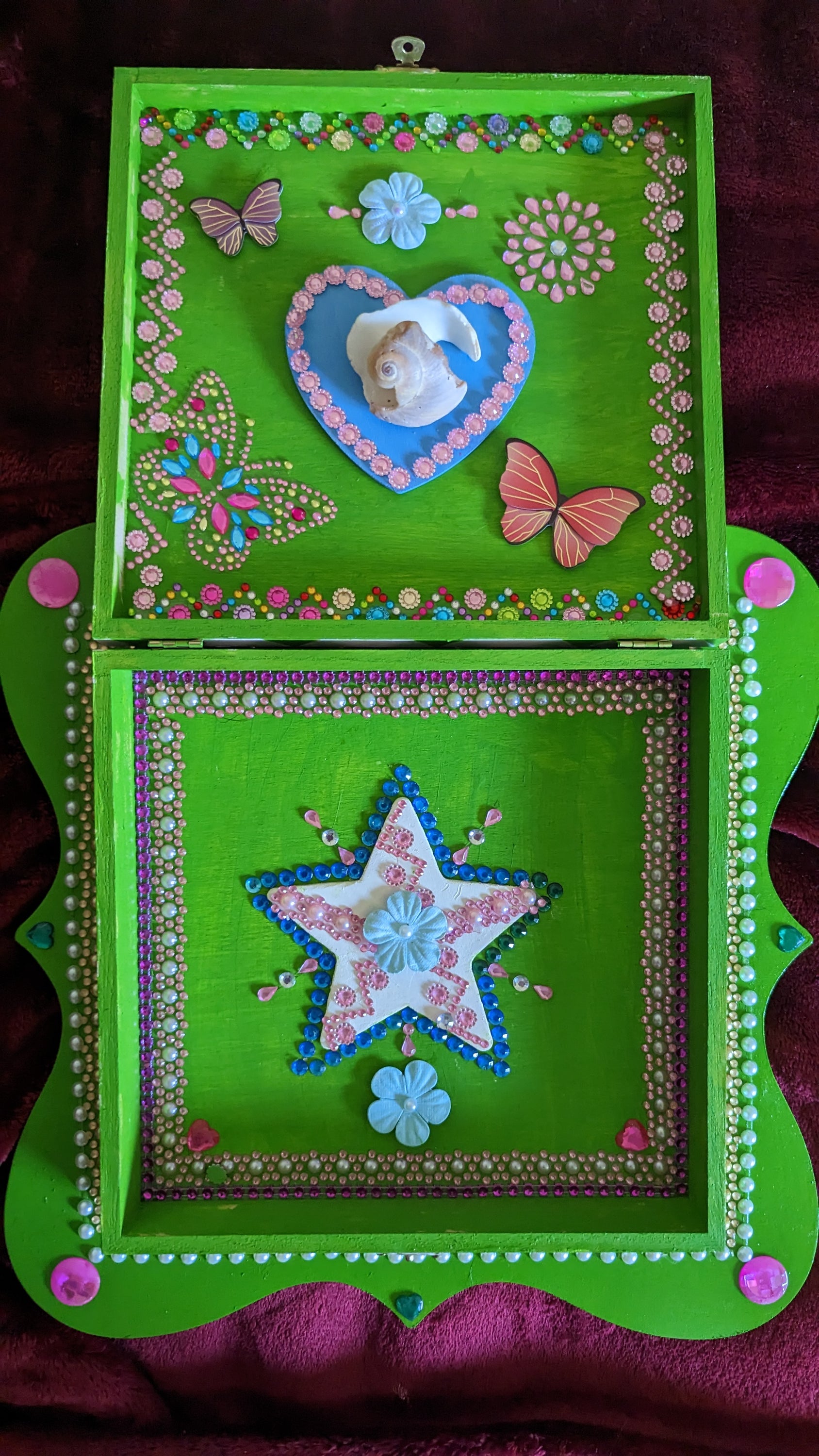 A beautifully hand-decorated Wish Box by Sharon Tatem featuring a powerful maiden, symbolizing dreams and aspirations.