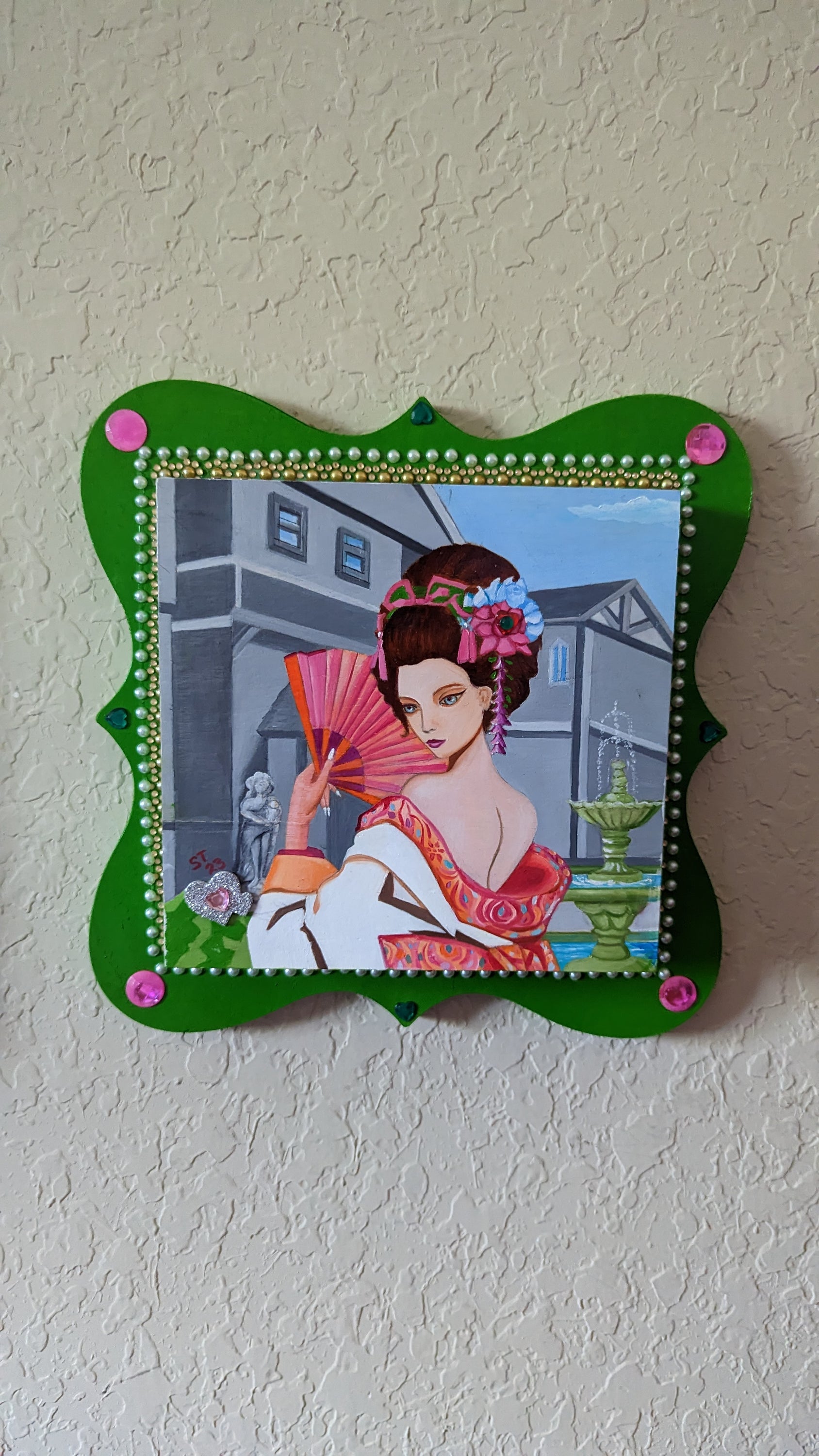 A beautifully hand-decorated Wish Box by Sharon Tatem featuring a powerful maiden, symbolizing dreams and aspirations.