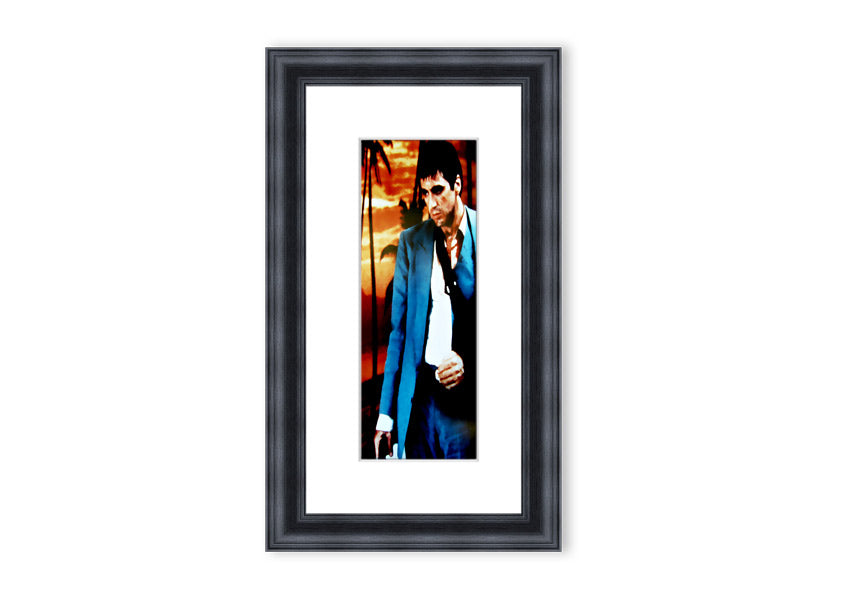 Framed print of Al Pacino as Tony Montana from Scarface, showcasing vibrant colors and quality craftsmanship.