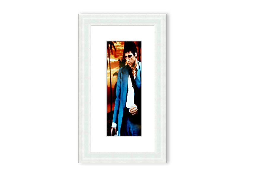 Framed print of Al Pacino as Tony Montana from Scarface, showcasing vibrant colors and quality craftsmanship.