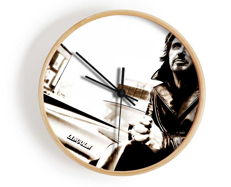 Al Pacino Streets clock made from natural bamboo with a round face and clear Plexiglas lens, available in black, white, and natural frame colors.