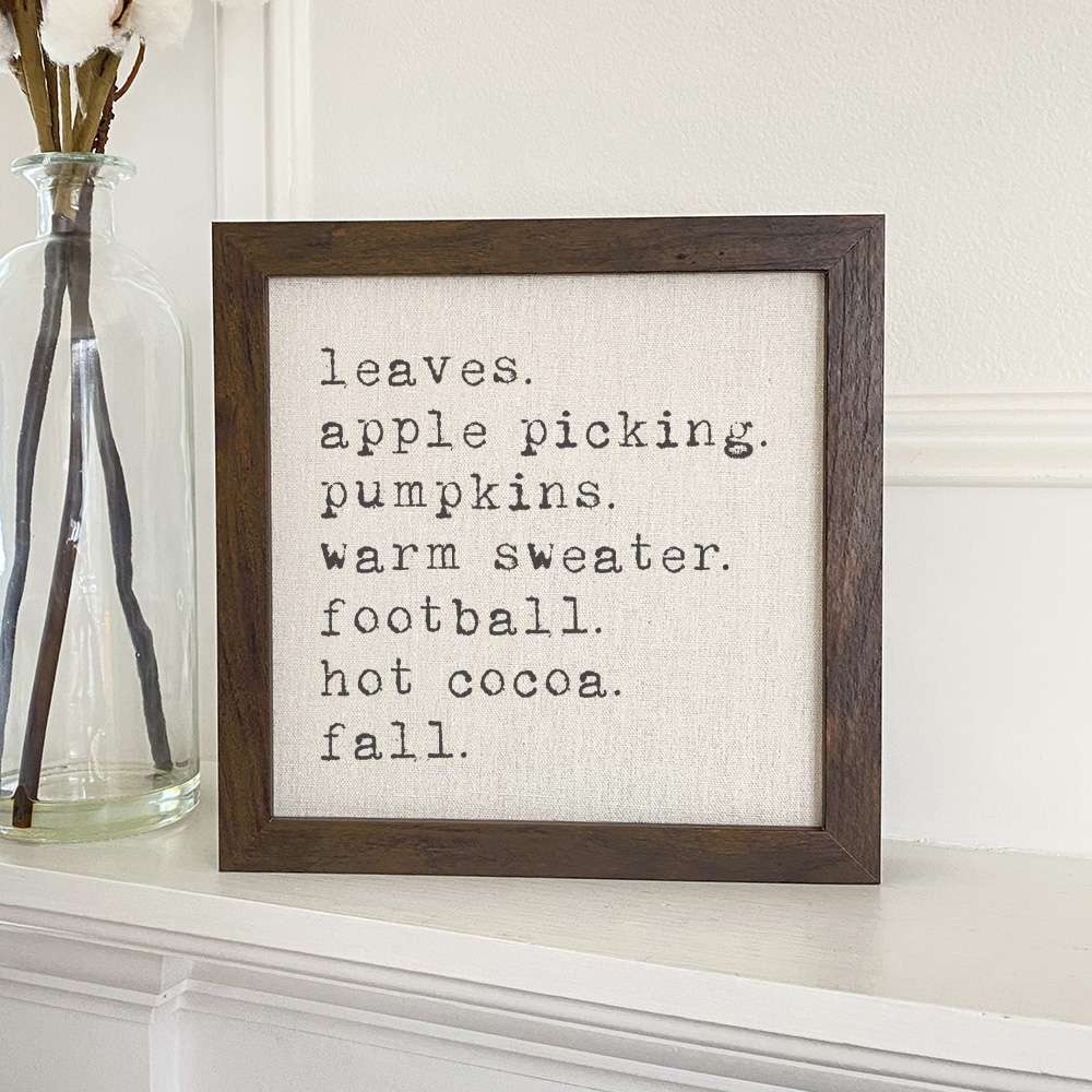 All Things Fall framed sign with a stylized wood frame, featuring a linen-look neutral background and eco-friendly printed design.