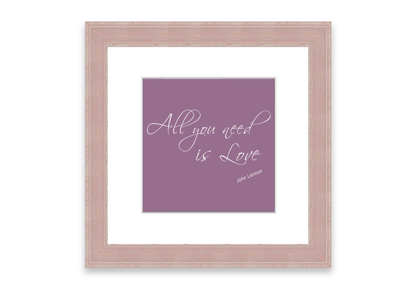 Framed print of 'All You Need Is Love 2' in dusty pink, showcasing a charming design with a stylish frame.