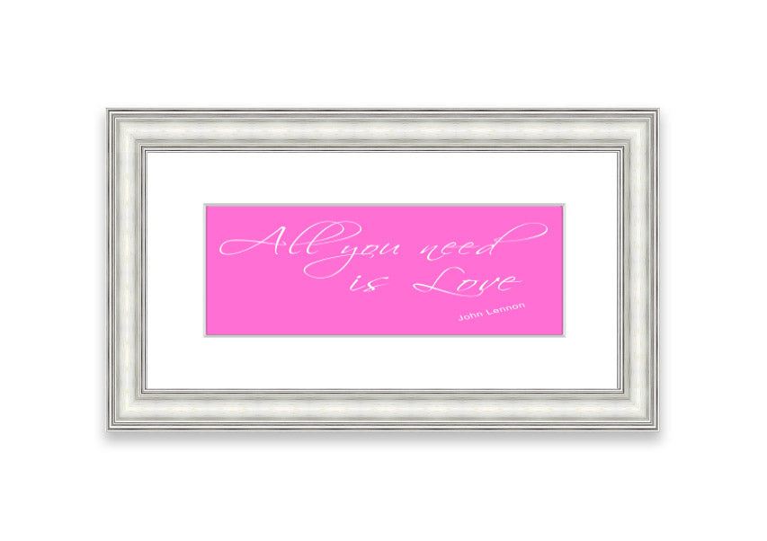 Framed print of 'All You Need Is Love 2' in vivid pink, showcasing a vibrant design with a stylish frame, ready to hang.