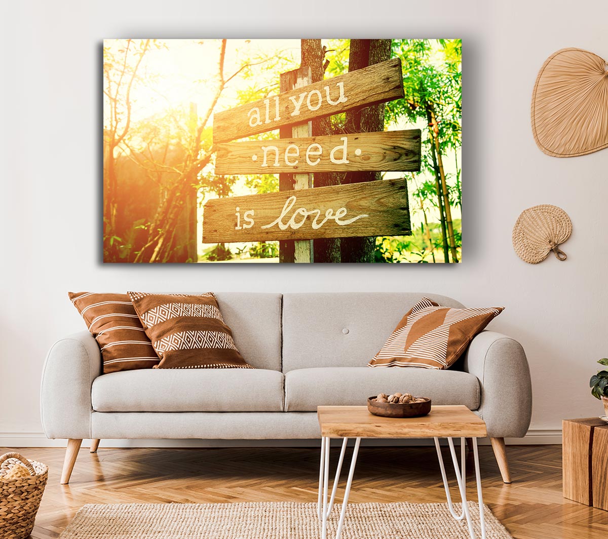 A vibrant canvas print featuring the phrase 'All You Need Is Love' mounted on a sturdy box frame, ready to hang.