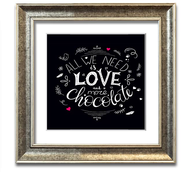 Square framed print featuring the phrase 'All You Need Is Love And More Chocolate' with colorful design, available in multiple frame colors.