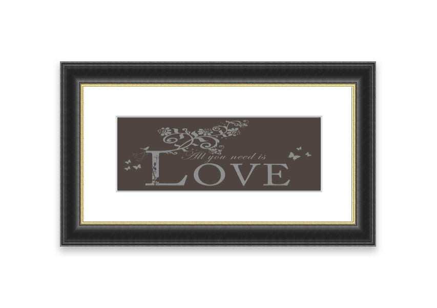 Framed print of All You Need Is Love Chocolate, showcasing vibrant colors and a heartwarming message, ready to hang.