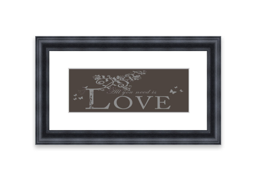 Framed print of All You Need Is Love Chocolate, showcasing vibrant colors and a heartwarming message, ready to hang.