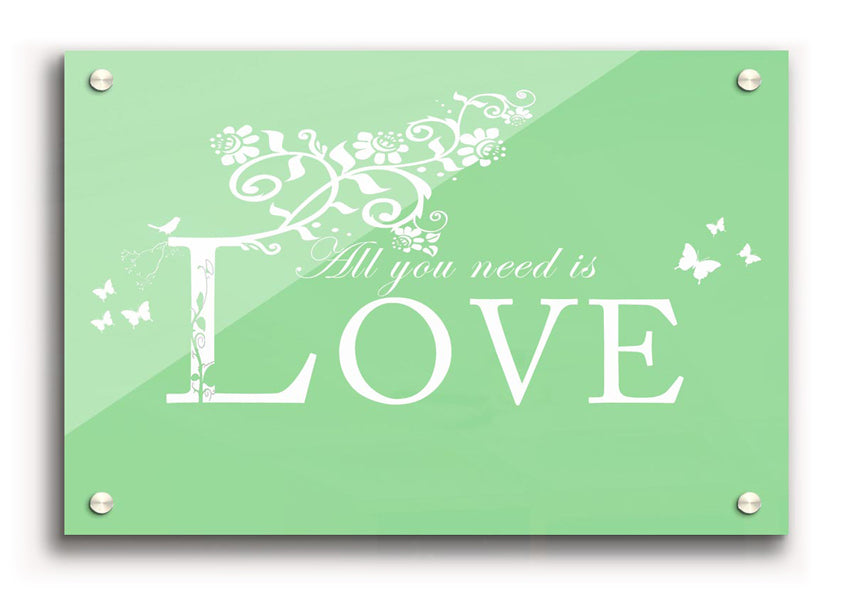 All You Need Is Love Green acrylic print on a wall, showcasing vibrant green colors and modern design.