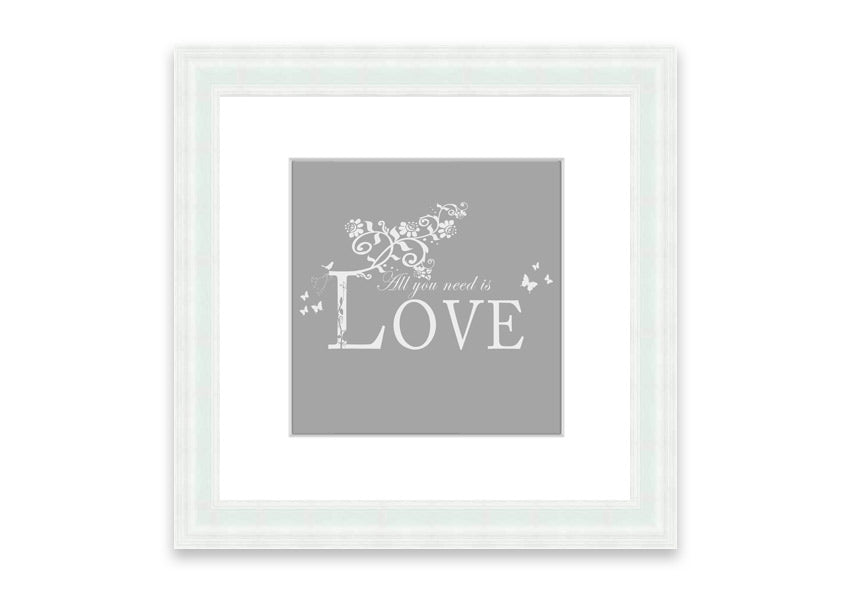 Framed print featuring the phrase 'All You Need Is Love' in grey and white, handmade in the UK.