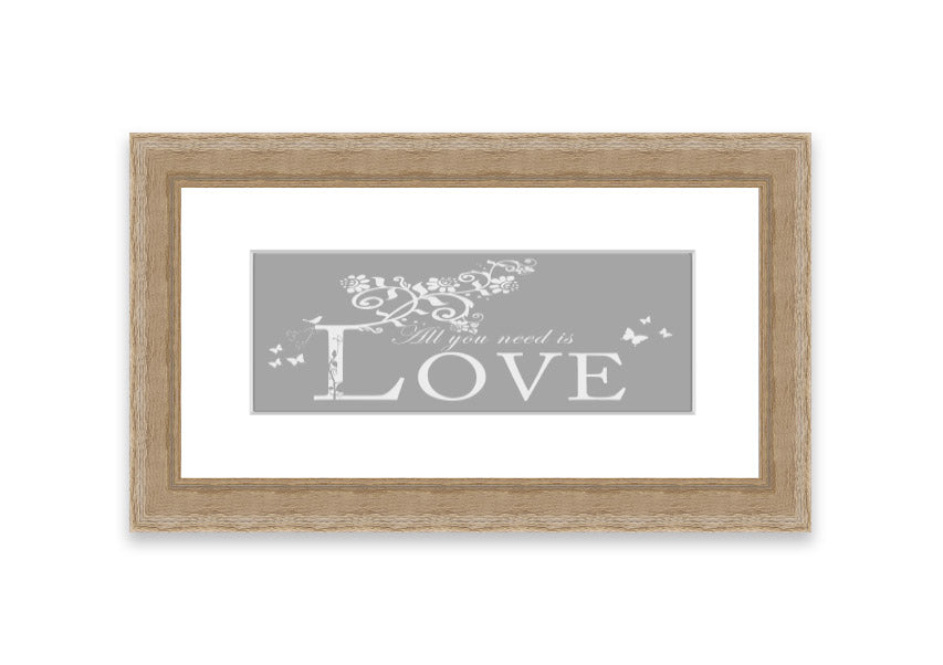 Framed print featuring the phrase 'All You Need Is Love' in grey and white, handmade in the UK.