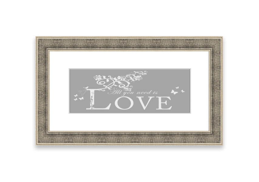 Framed print featuring the phrase 'All You Need Is Love' in grey and white, handmade in the UK.