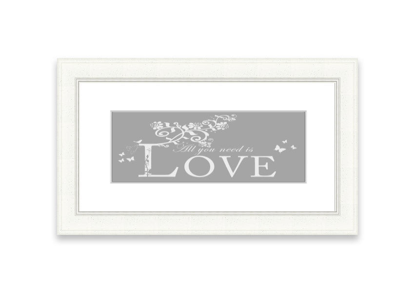 Framed print featuring the phrase 'All You Need Is Love' in grey and white, handmade in the UK.