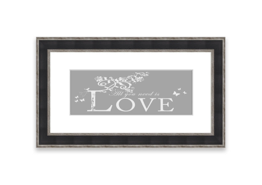 Framed print featuring the phrase 'All You Need Is Love' in grey and white, handmade in the UK.