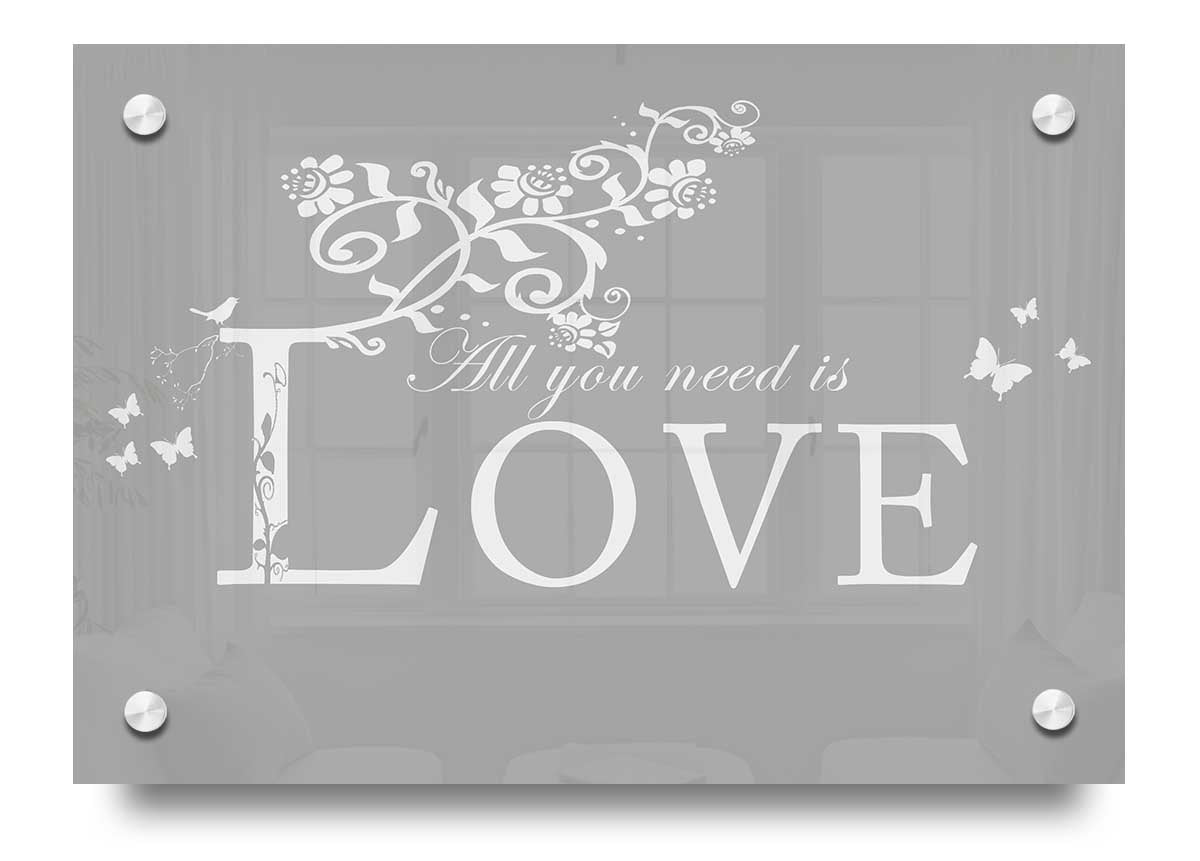 All You Need Is Love Grey White acrylic print on a wall, showcasing its elegant design and vibrant colors.