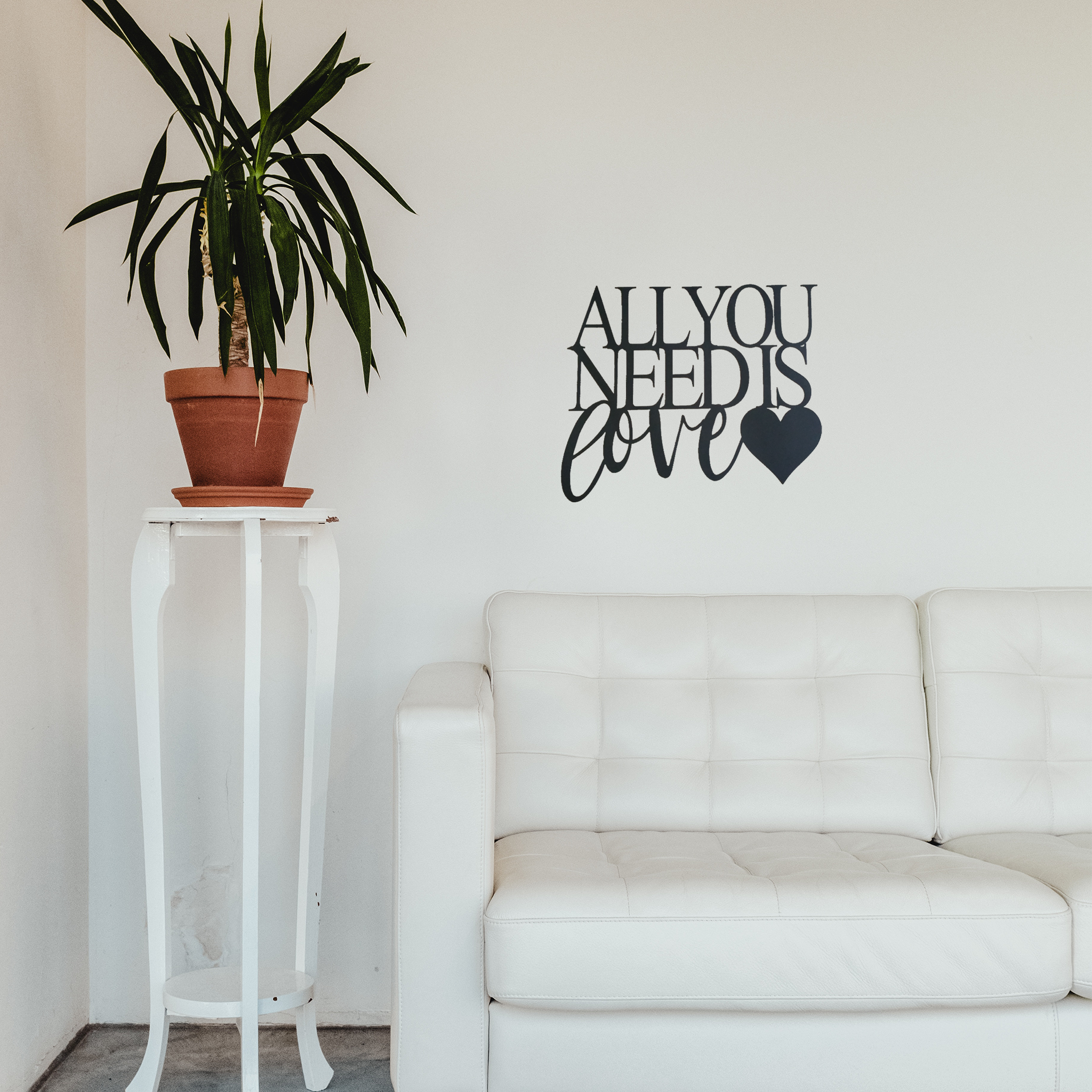 All You Need Is Love metal wall art in low gloss black finish, measuring 26 inches wide and 20 inches tall, perfect for home decor.