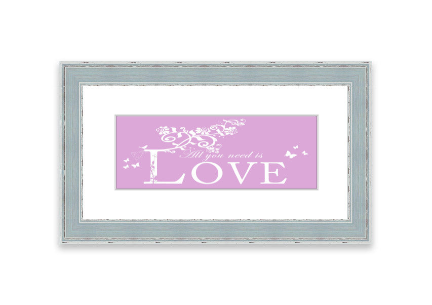 Framed print featuring the phrase 'All You Need Is Love' in pink, beautifully crafted and ready to hang.