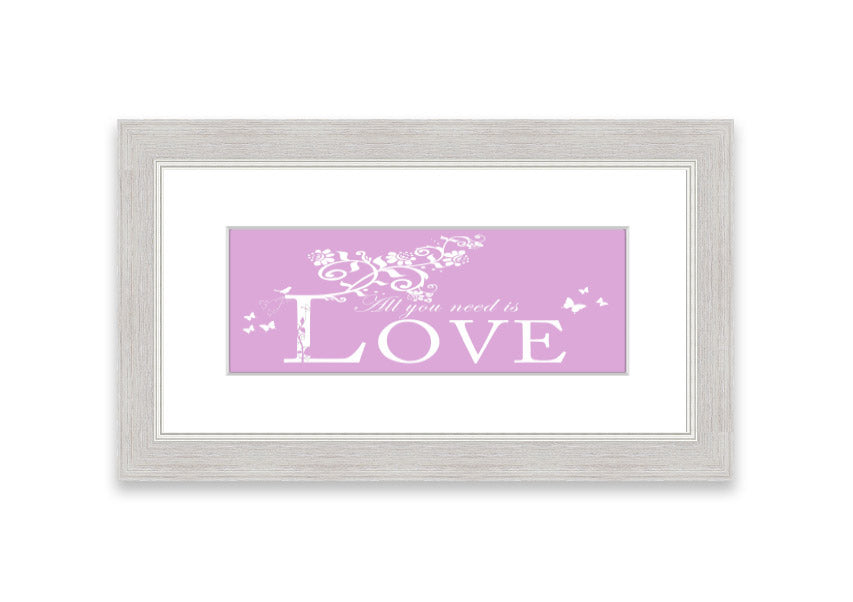 Framed print featuring the phrase 'All You Need Is Love' in pink, beautifully crafted and ready to hang.