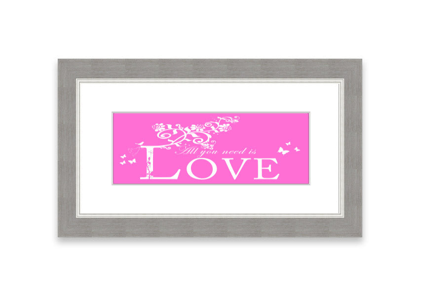 A vibrant pink framed print featuring the phrase 'All You Need Is Love', handmade in the UK, ready to hang.