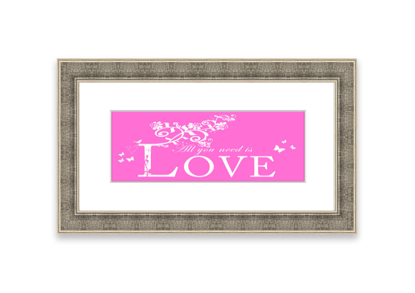 A vibrant pink framed print featuring the phrase 'All You Need Is Love', handmade in the UK, ready to hang.