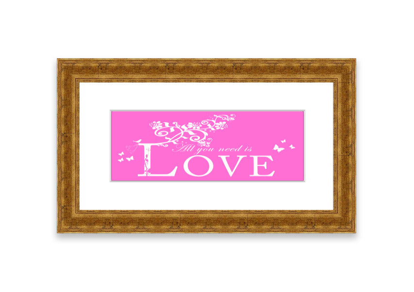 A vibrant pink framed print featuring the phrase 'All You Need Is Love', handmade in the UK, ready to hang.