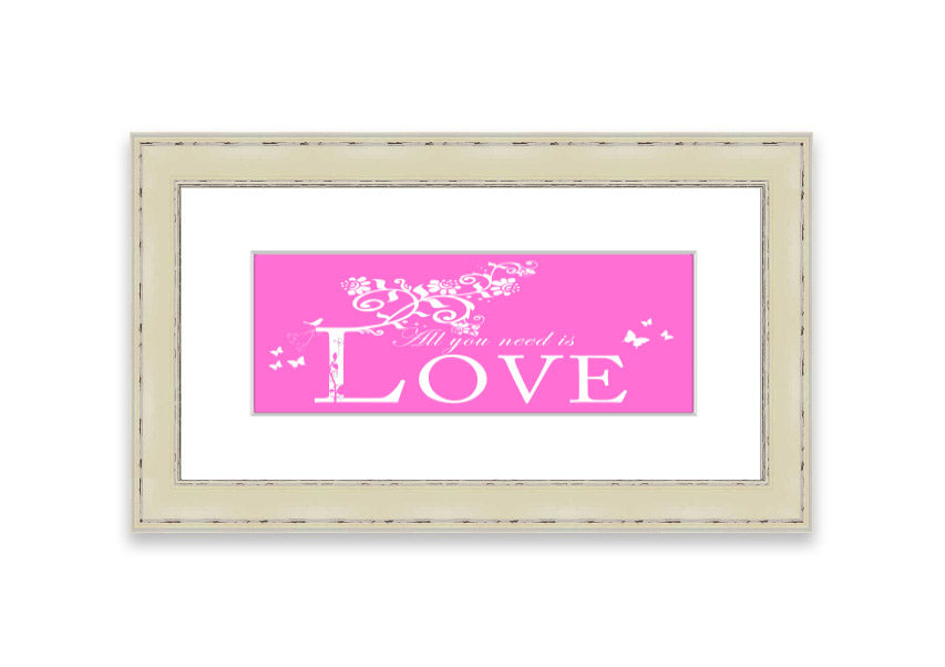 A vibrant pink framed print featuring the phrase 'All You Need Is Love', handmade in the UK, ready to hang.