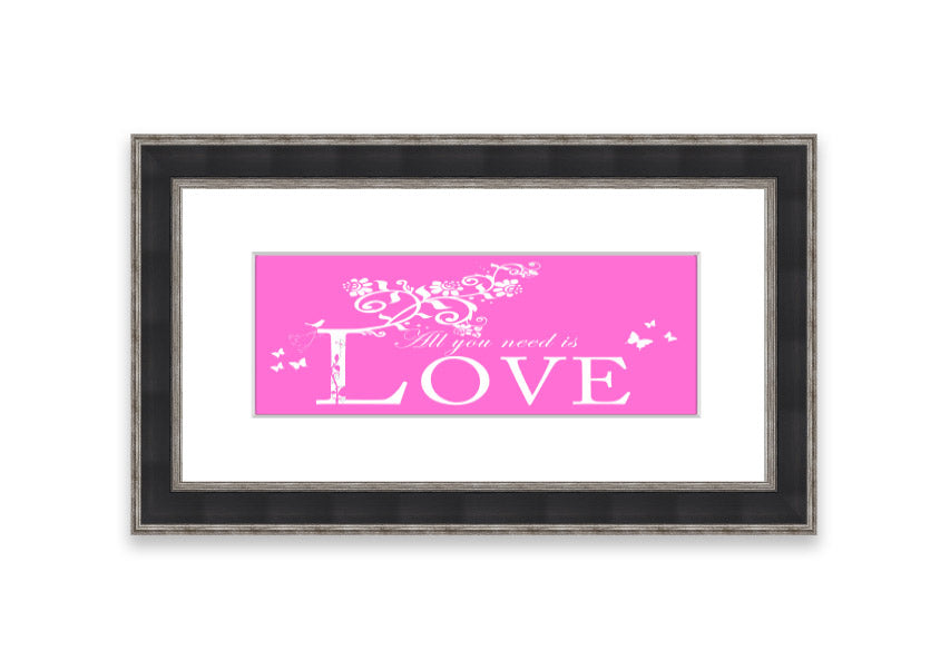 A vibrant pink framed print featuring the phrase 'All You Need Is Love', handmade in the UK, ready to hang.