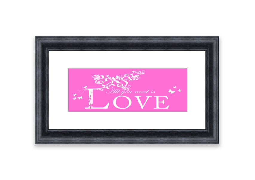 A vibrant pink framed print featuring the phrase 'All You Need Is Love', handmade in the UK, ready to hang.