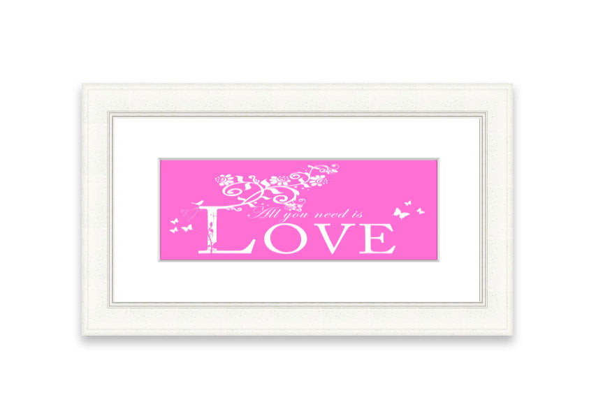 A vibrant pink framed print featuring the phrase 'All You Need Is Love', handmade in the UK, ready to hang.