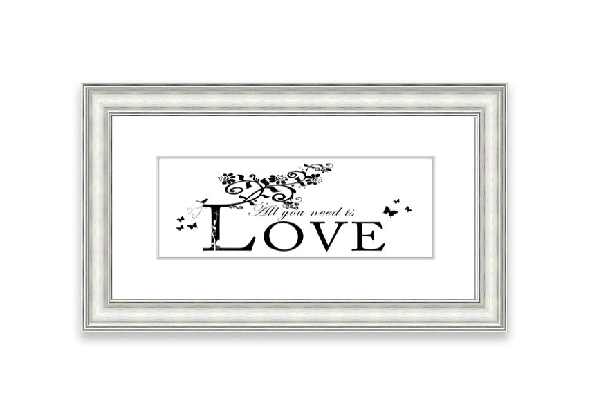 All You Need Is Love White framed print with a heartfelt message, available in various frame colors, handmade in the UK.