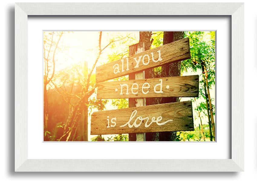 Framed print featuring the quote 'All You Need Is Love' in a stylish frame, handmade in the UK.