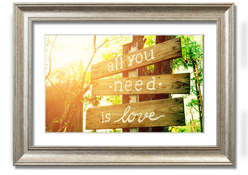 Framed print featuring the quote 'All You Need Is Love' in a stylish frame, handmade in the UK.