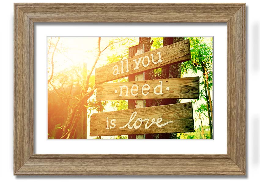 Framed print featuring the quote 'All You Need Is Love' in a stylish frame, handmade in the UK.