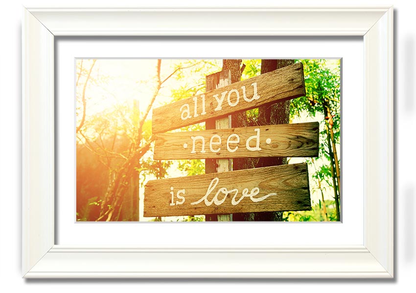 Framed print featuring the quote 'All You Need Is Love' in a stylish frame, handmade in the UK.