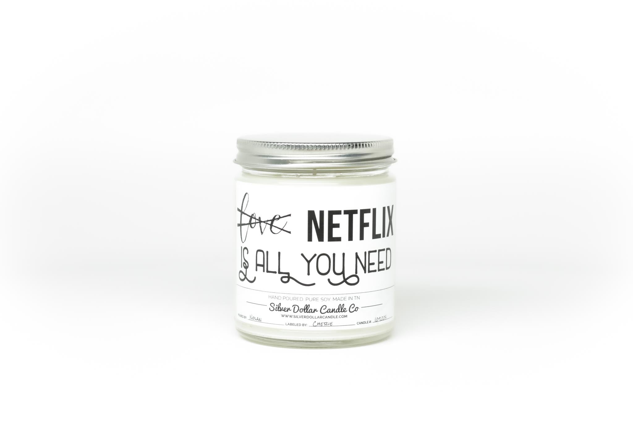 All You Need Is Netflix Soy Candle in a decorative box, showcasing its beautiful design and personalized lid option.