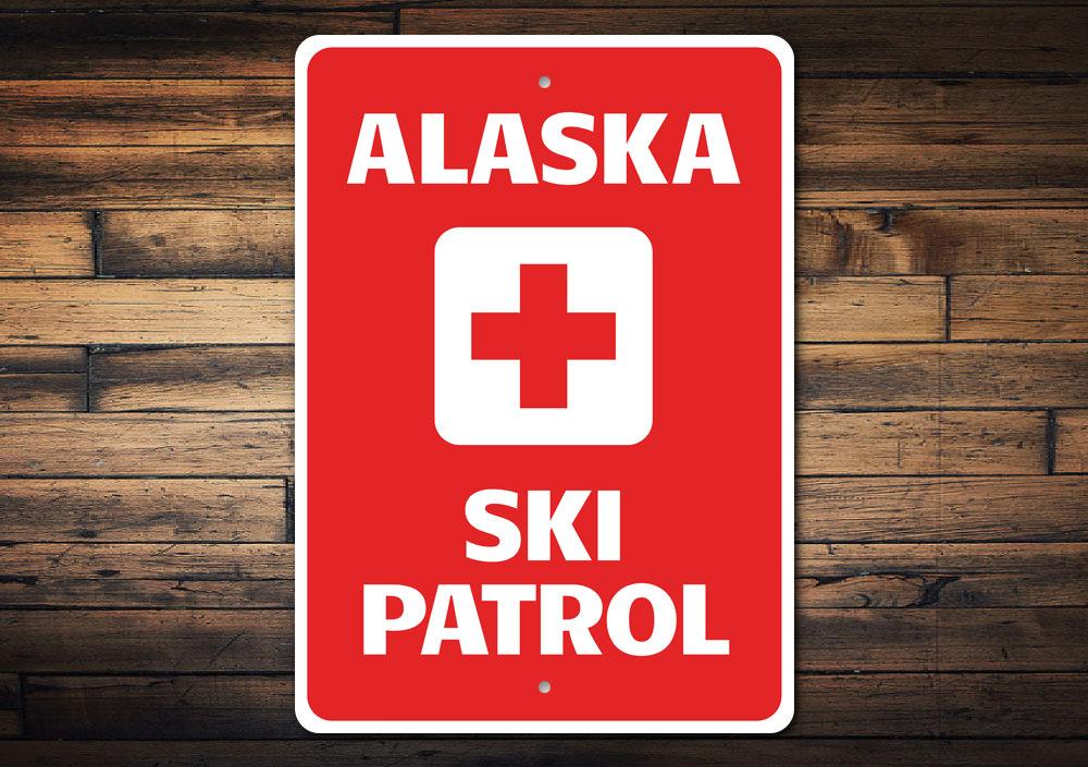 Alaska Ski Patrol Sign made of high-quality aluminum, featuring a decorative design suitable for indoor and outdoor use.