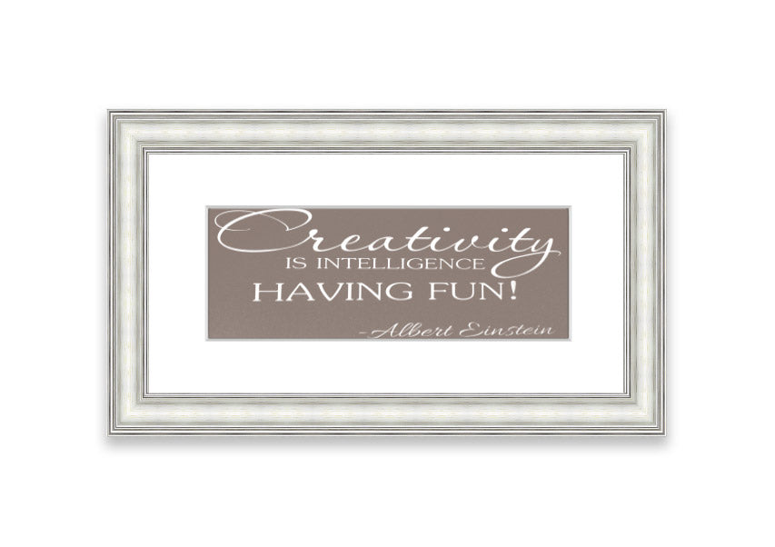 Framed print featuring Albert Einstein's quote on creativity and intelligence, elegantly designed in beige with multiple frame color options.