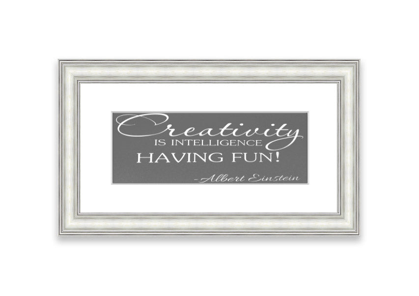 Framed print featuring Albert Einstein's quote on creativity and intelligence, elegantly designed in grey tones.