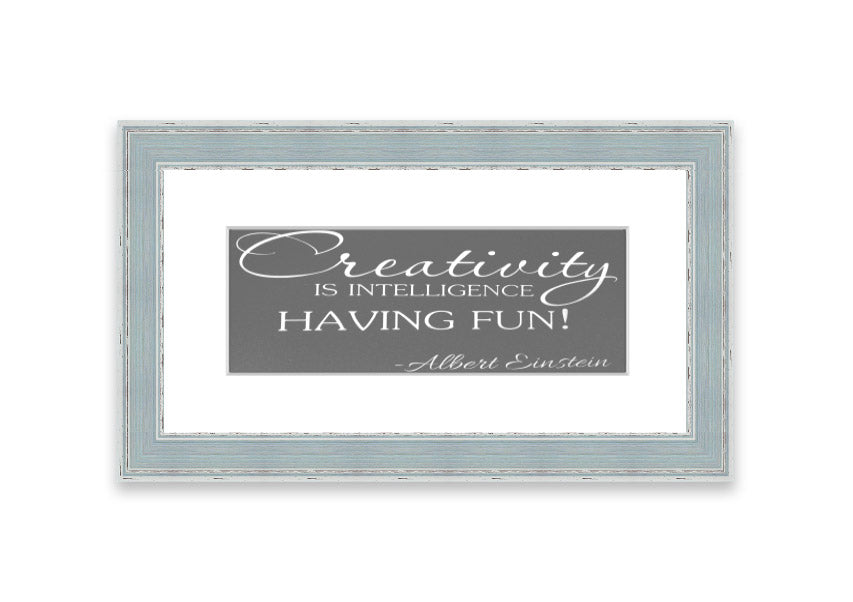 Framed print featuring Albert Einstein's quote on creativity and intelligence, elegantly designed in grey tones.