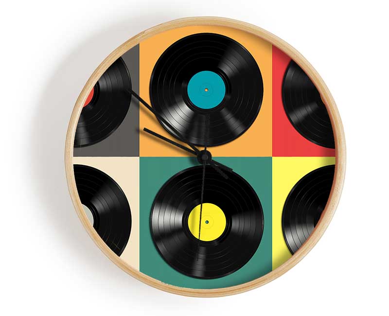 A stylish round clock made from natural bamboo with a clear Plexiglas lens, available in black, white, and natural frame colors.