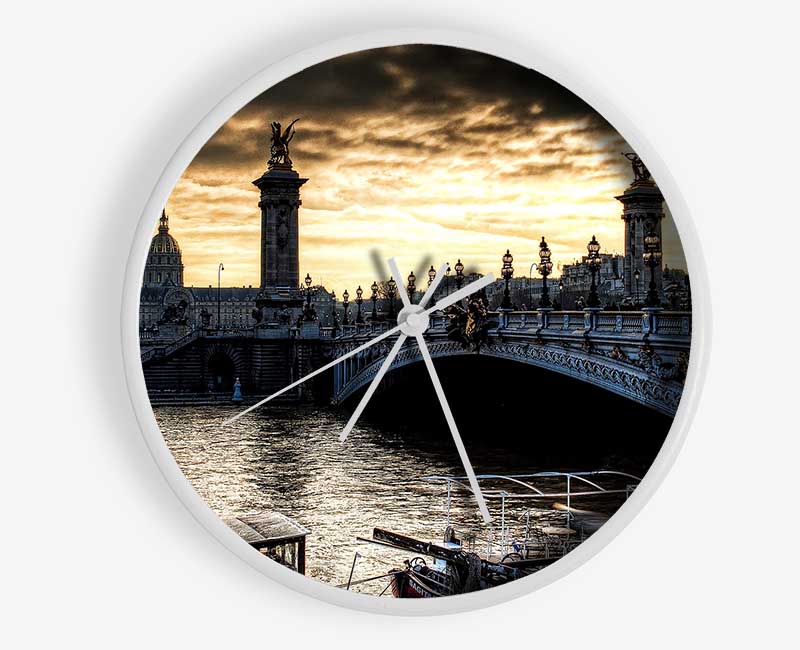 Alexander Bridge Paris clock made from natural bamboo with a round face and clear Plexiglas lens, available in black, white, and natural frame colors.